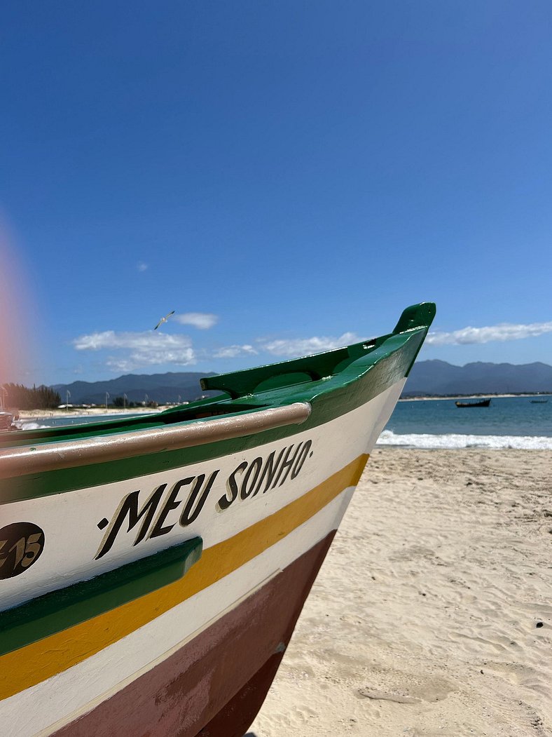 Casa Sol e Mar próxima da praia, com ar