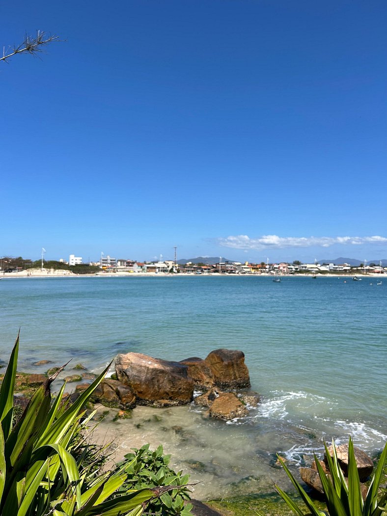 Casa Sol e Mar próxima da praia, com ar